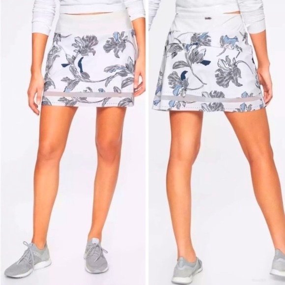 Athleta Dresses & Skirts - ATHLETA Laser Tennis Skort Floral Nouveau White Black Navy